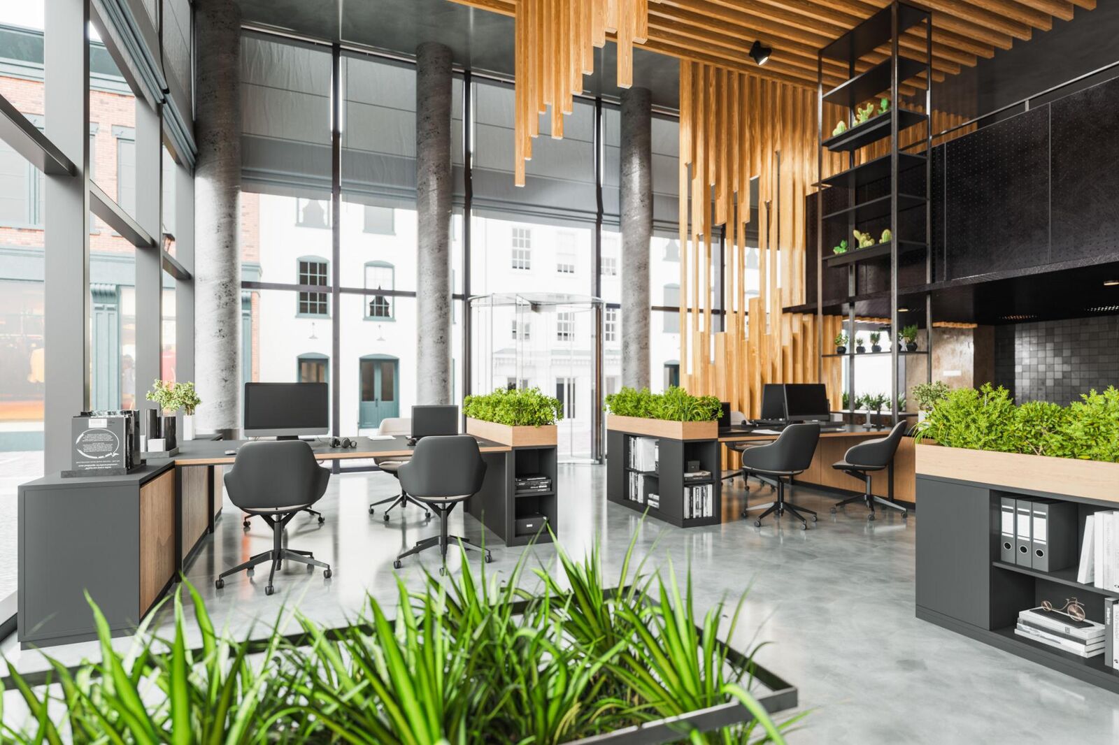 Espace de travail végétalisé équipé de mobilier reconditionné